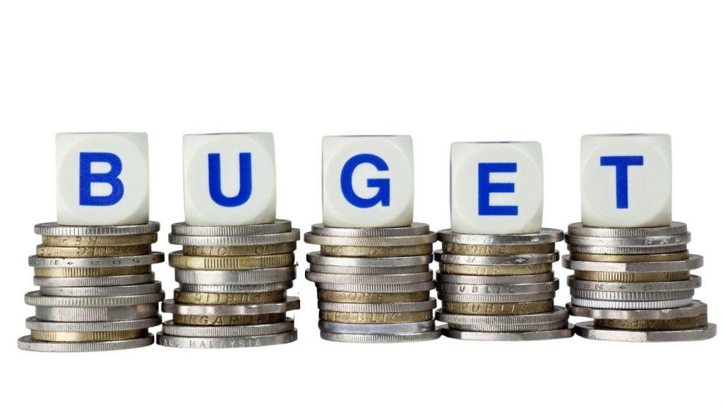 Alba neagra cu amendamentele la buget. Bolojan simte în ceafă răsuflarea lui Predoiu. Cine pierde și cine câștigă